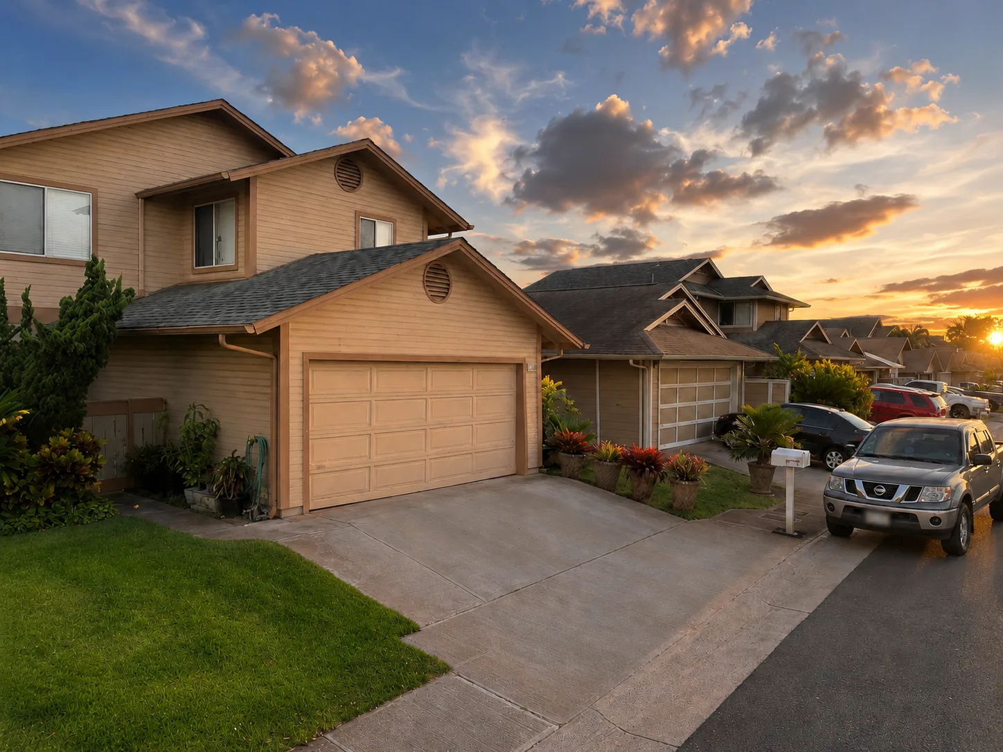 Clean residential garage door after repair on an Ewa home.
